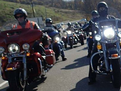 Several motorcyclists driving in row #2