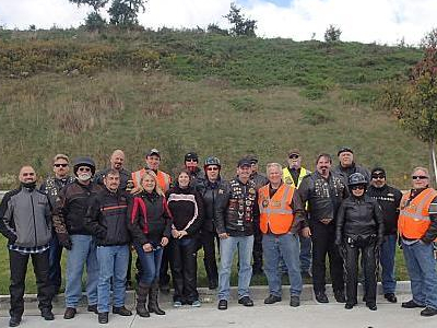 Several persons taking a photograph with a hill of background #1